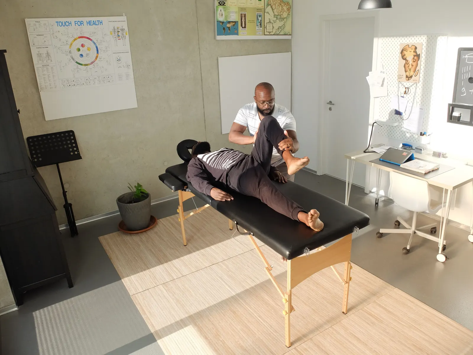 A care provider helping a patient during an appointment